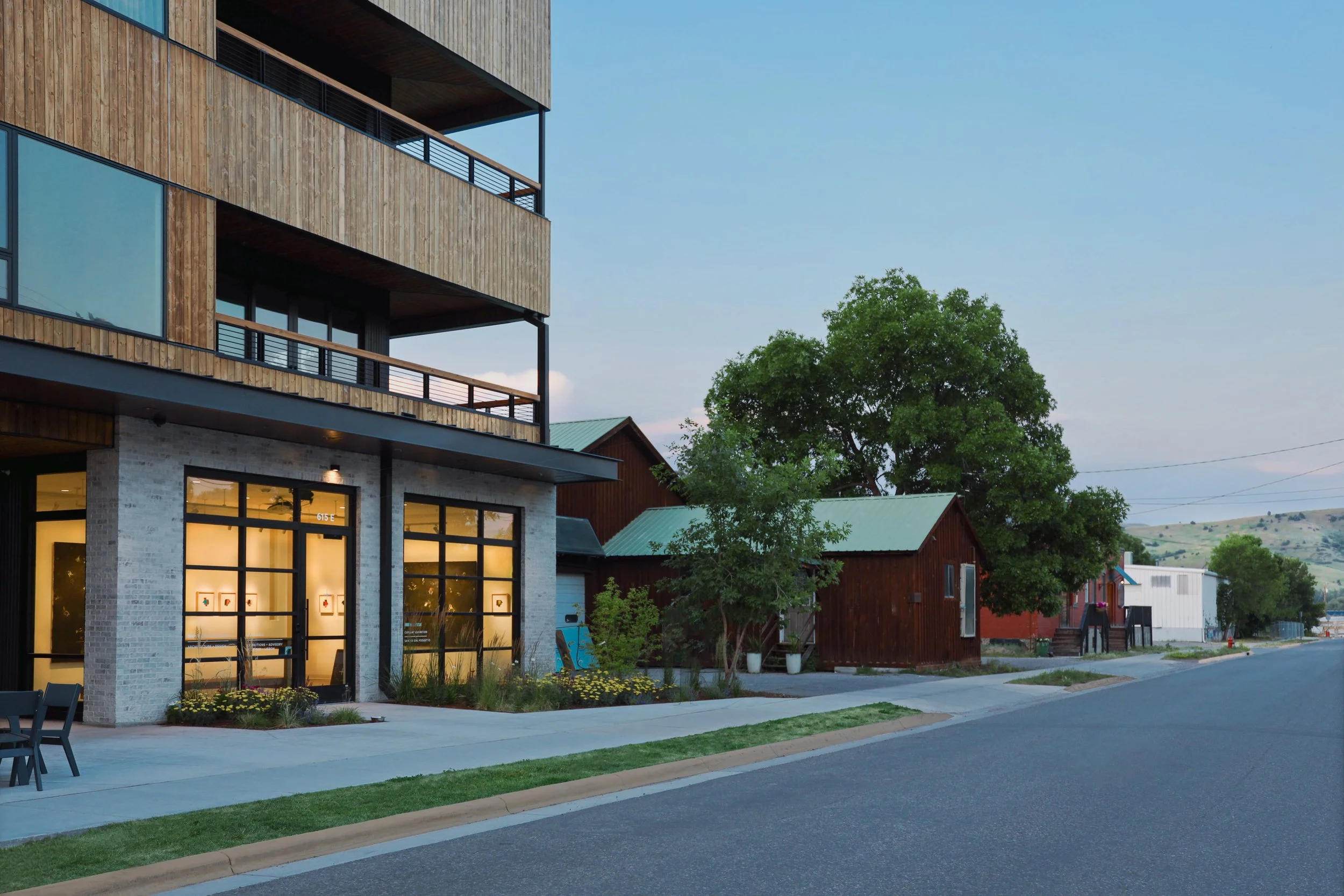 Echo Arts gallery storefront at dusk on East Peach Street, Bozeman